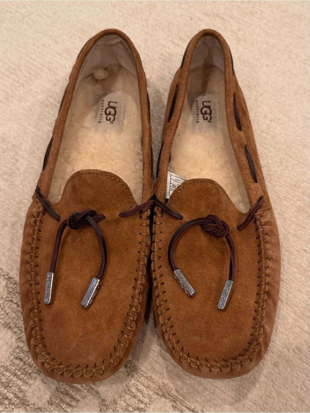 Women’s UGG Moccasin Slippers, size 9, chestnut